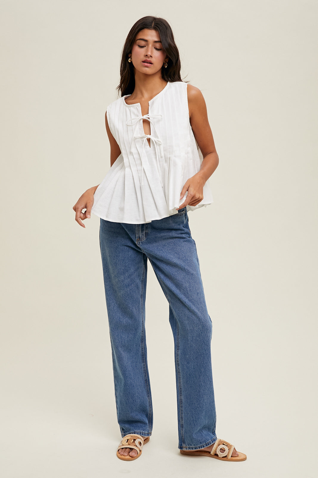 Amara BOW DETAIL SLEEVELESS PLEATED TOP