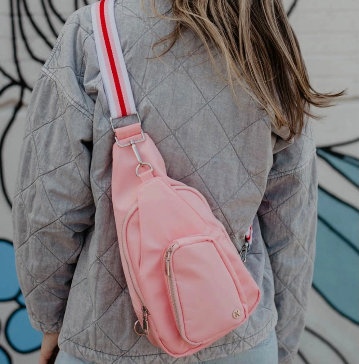 Light Pink Solid Sling Bag with Striped Strap
