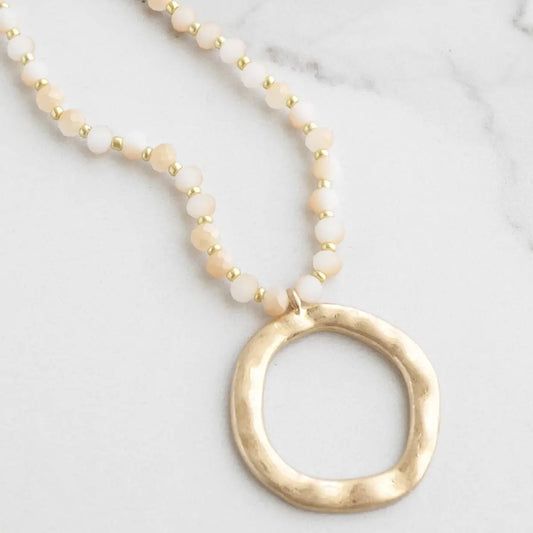 Beaded Necklace with Gold Tone Circle Pendant Light Brown